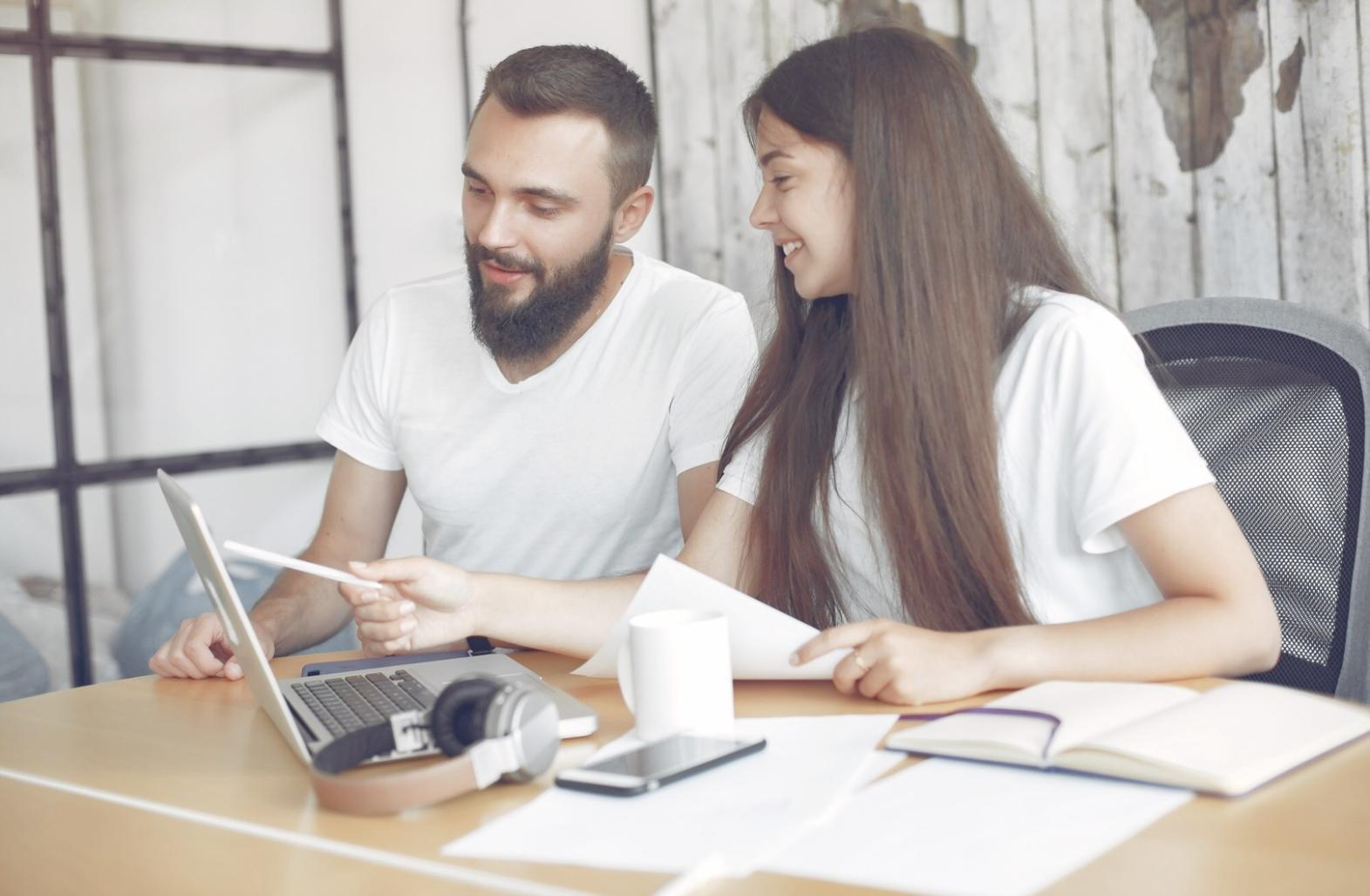 Finance professional reviewing budget reports with clear visualizations